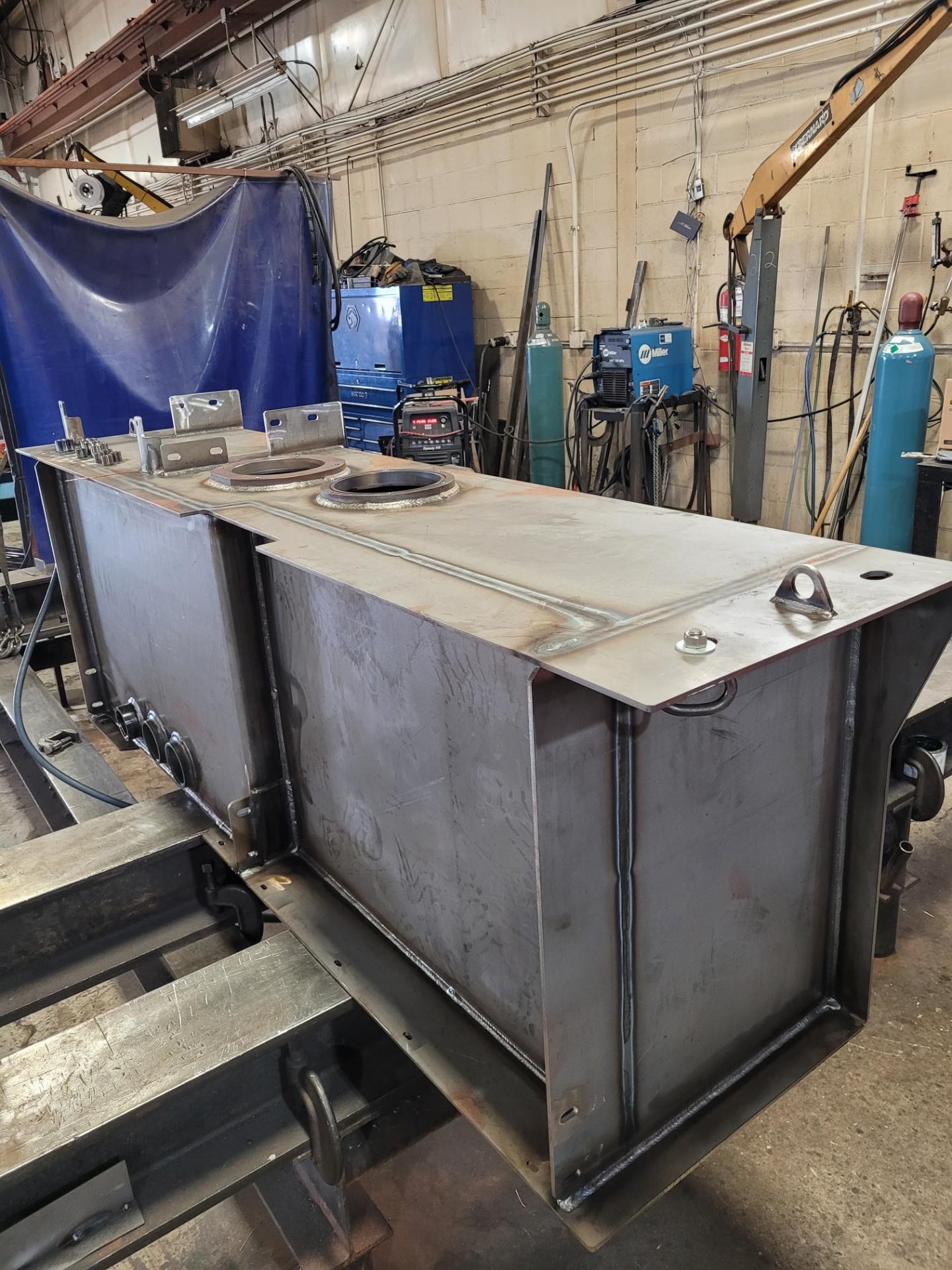 Cincinnati Metal Fabricating workshop with American flag