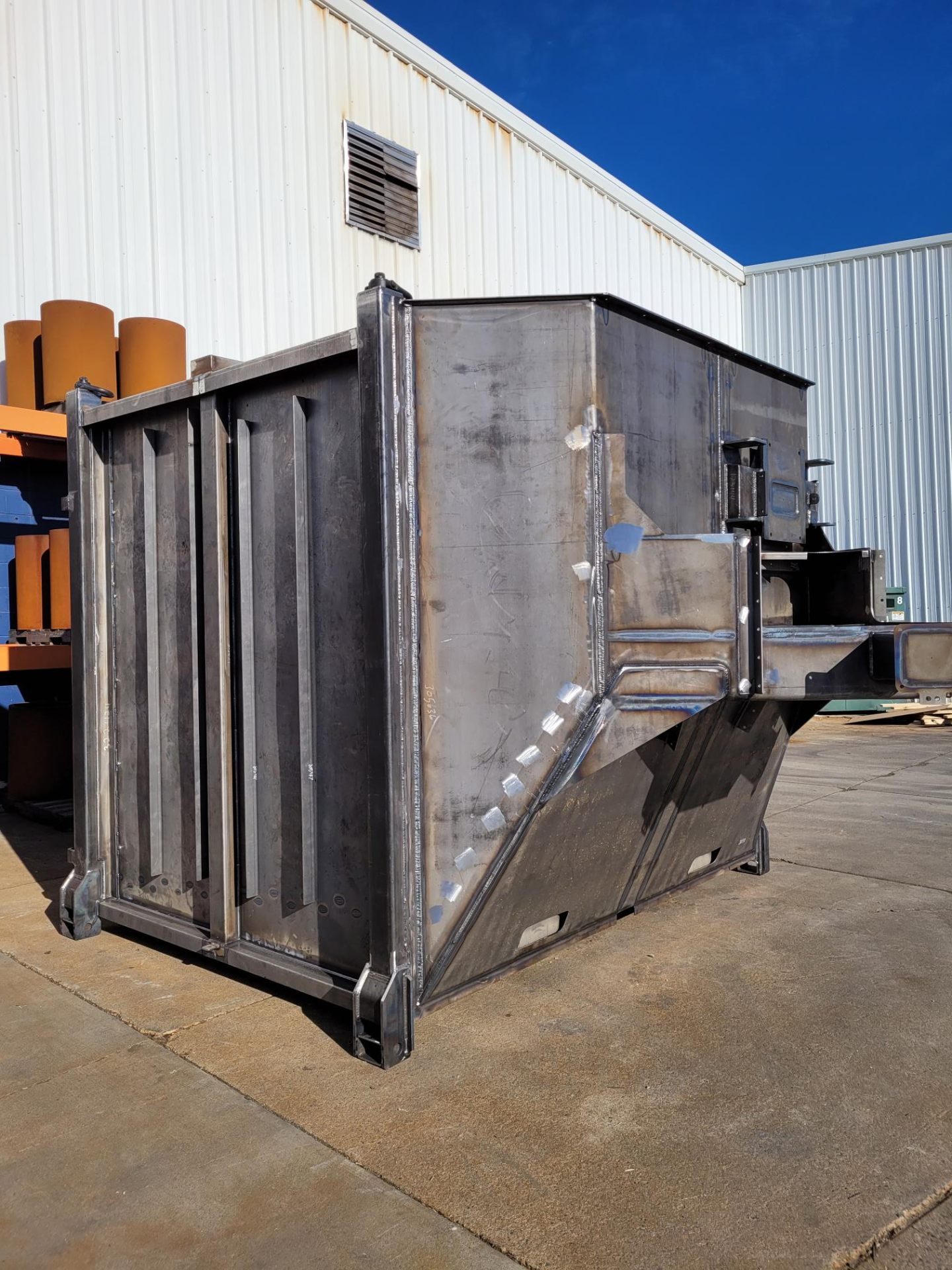 Team working on a hopper assembly