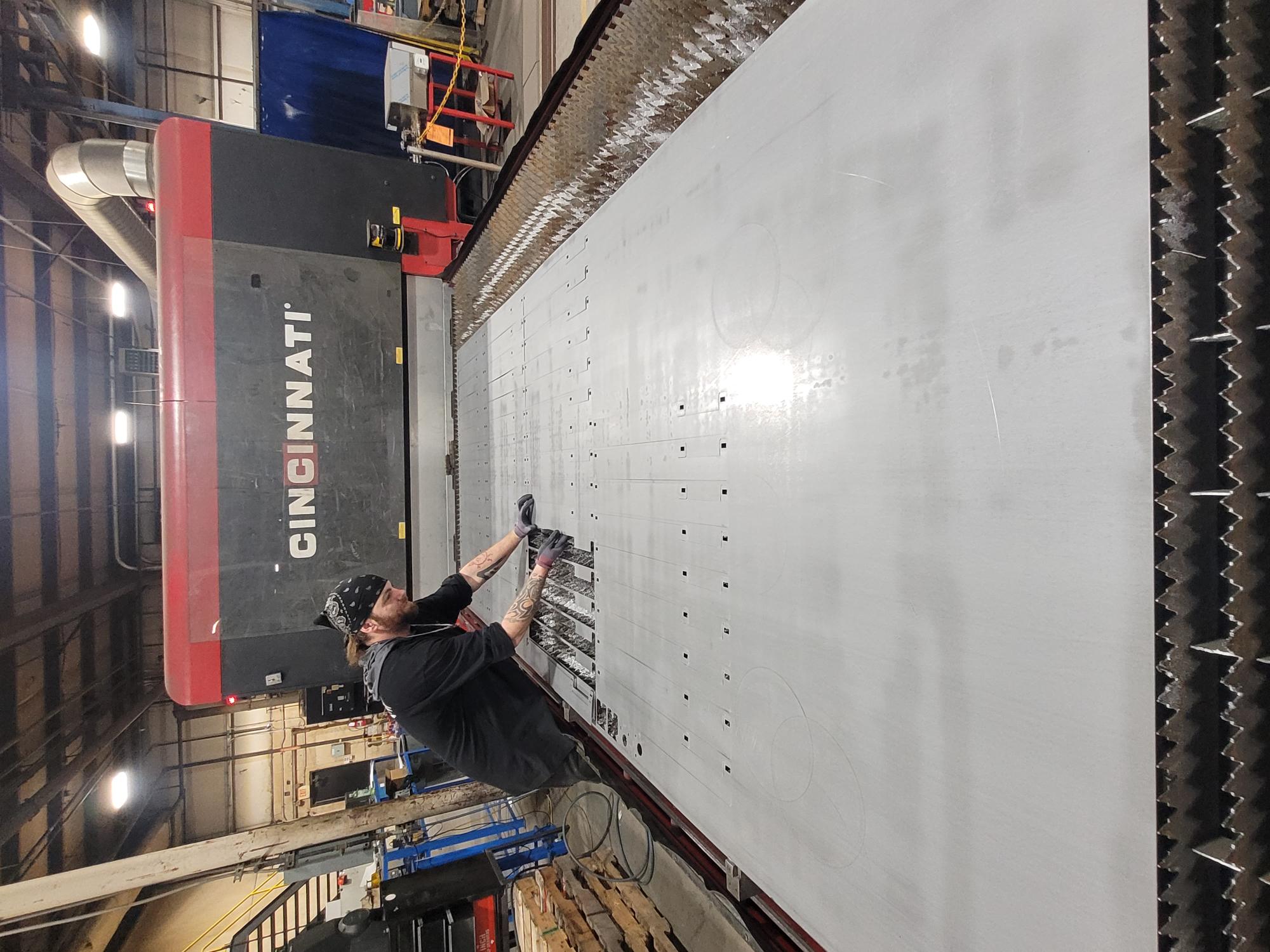 Laser operator at Cincinnati machine