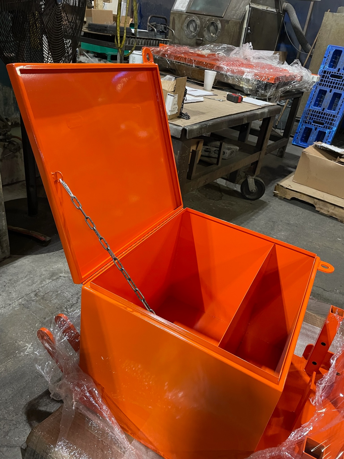 Custom orange powder-coated storage box with hinged lid
