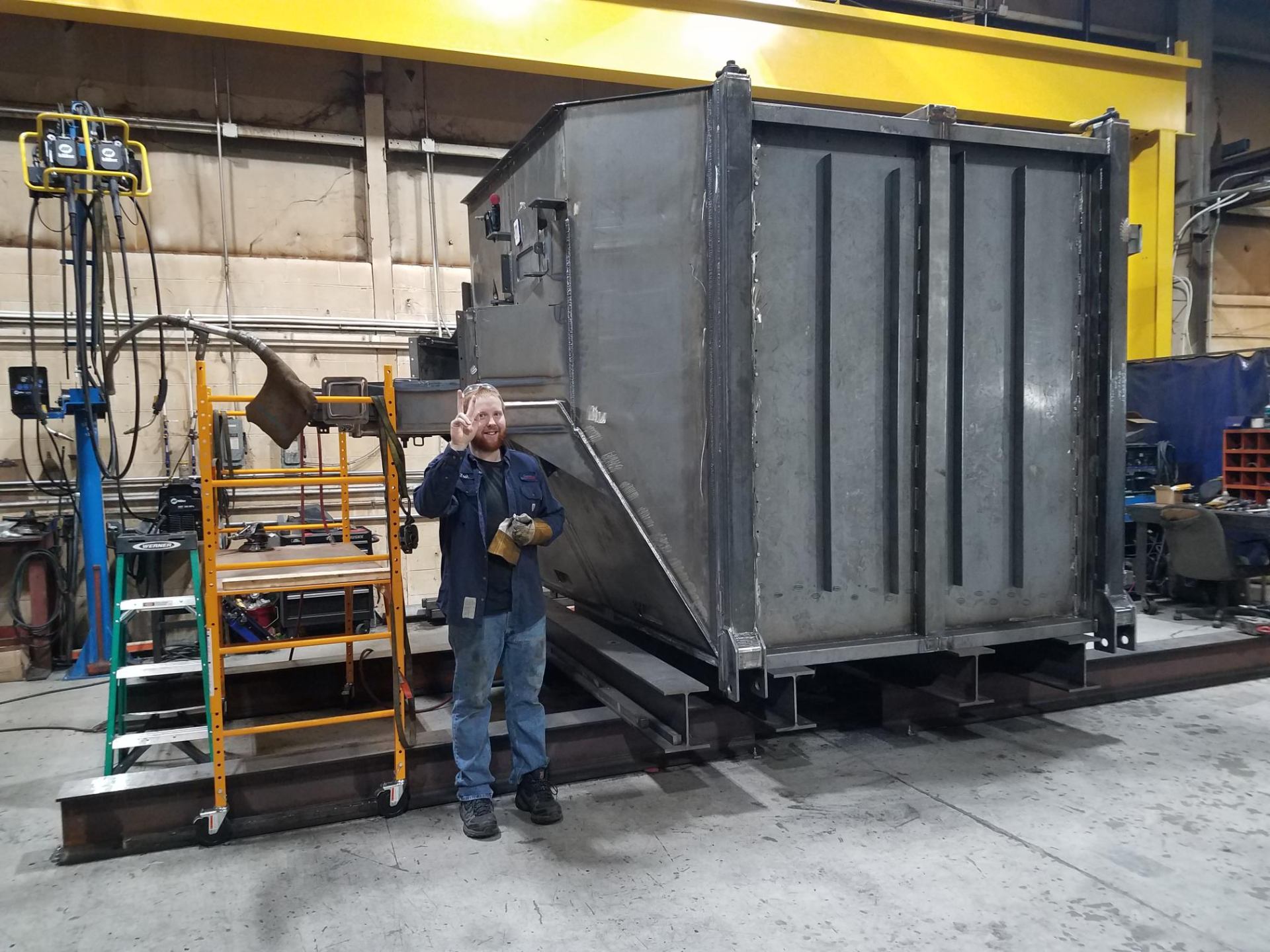 Fabricator with completed large industrial hopper