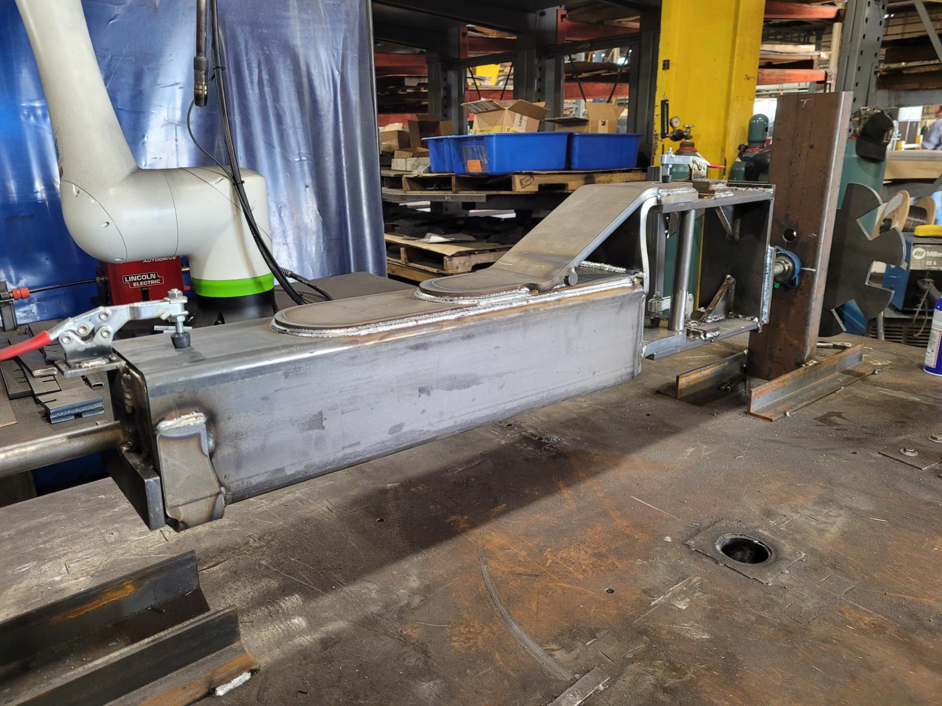 Robotic welding station with fabricated steel component