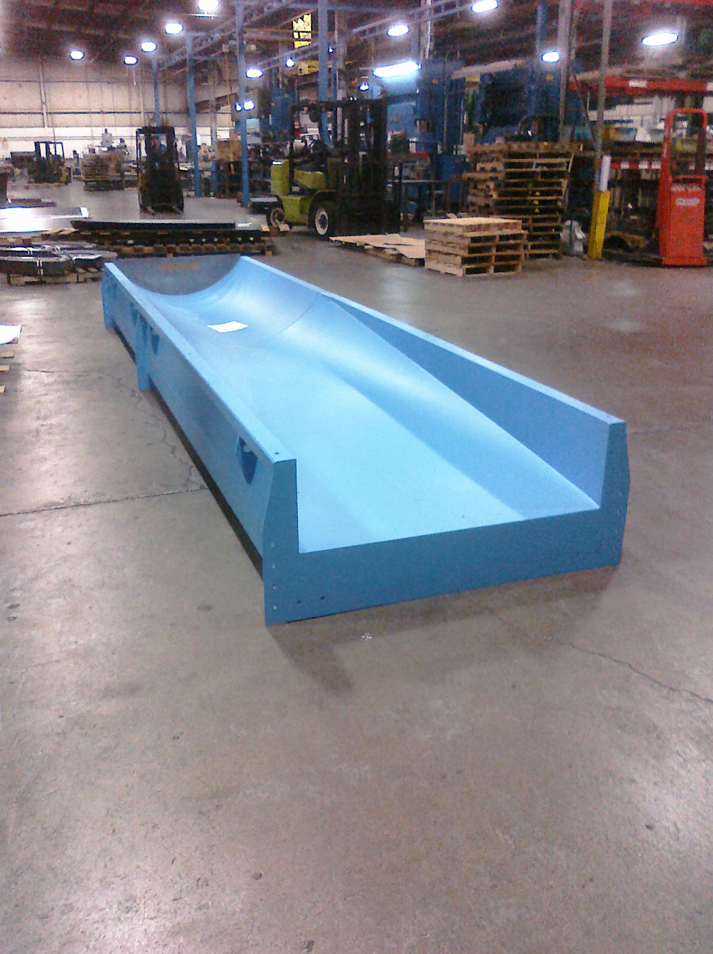 Large custom fabricated steel trough with precision finish